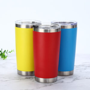 Three stainless steel cups: red, blue, yellow.